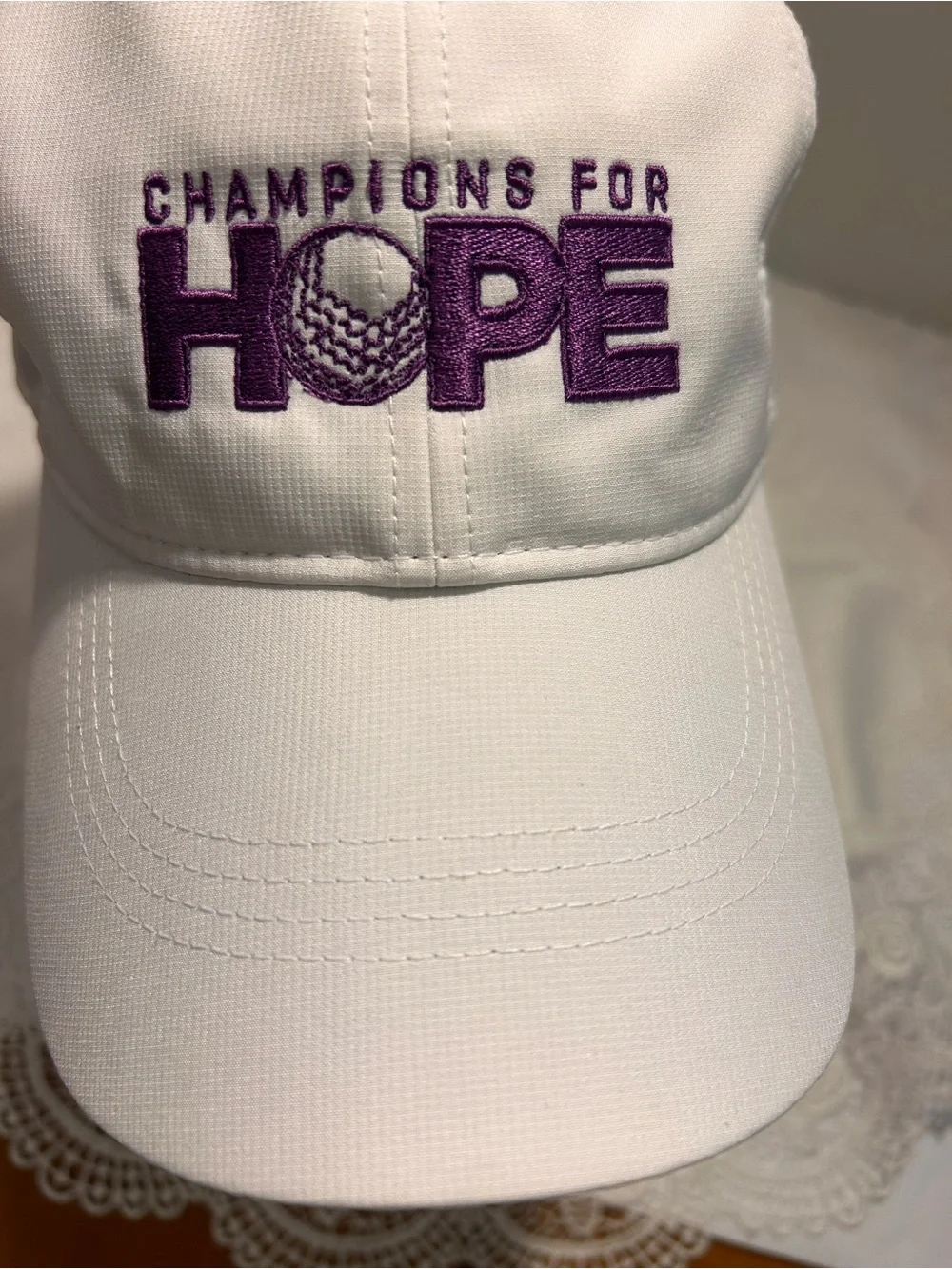 Nike Champions For Hope Dri-Fit Golf Cap with purple embroidery